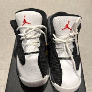 Jordan 13 retro black, university red and white used size 9 toddler.